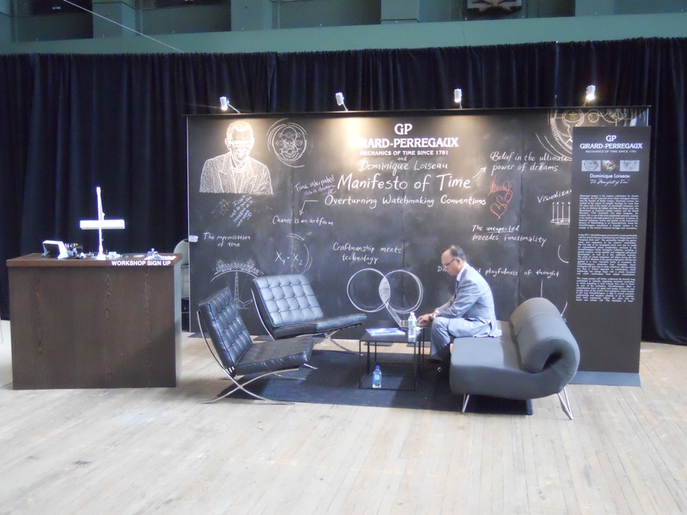 Custom Trade Booth Design with Barcelona furniture